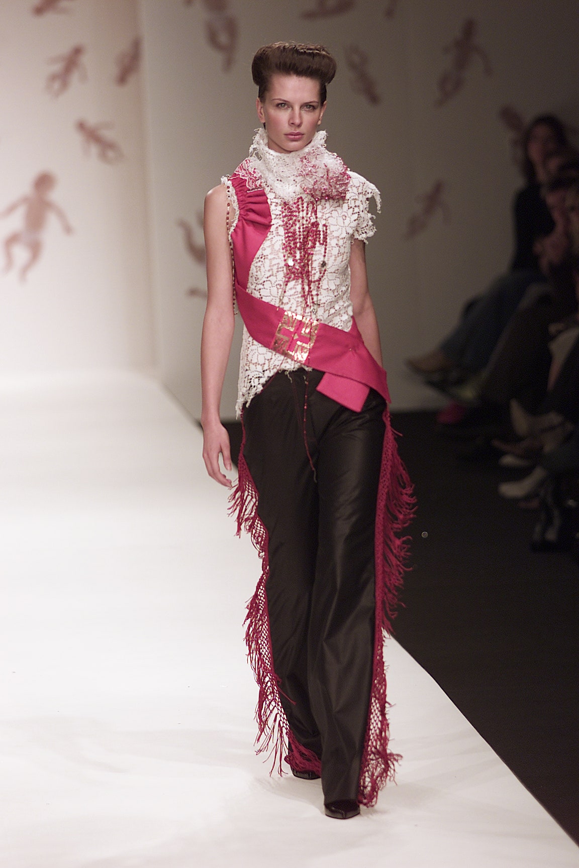 white lace sleeveless top and black leather pants