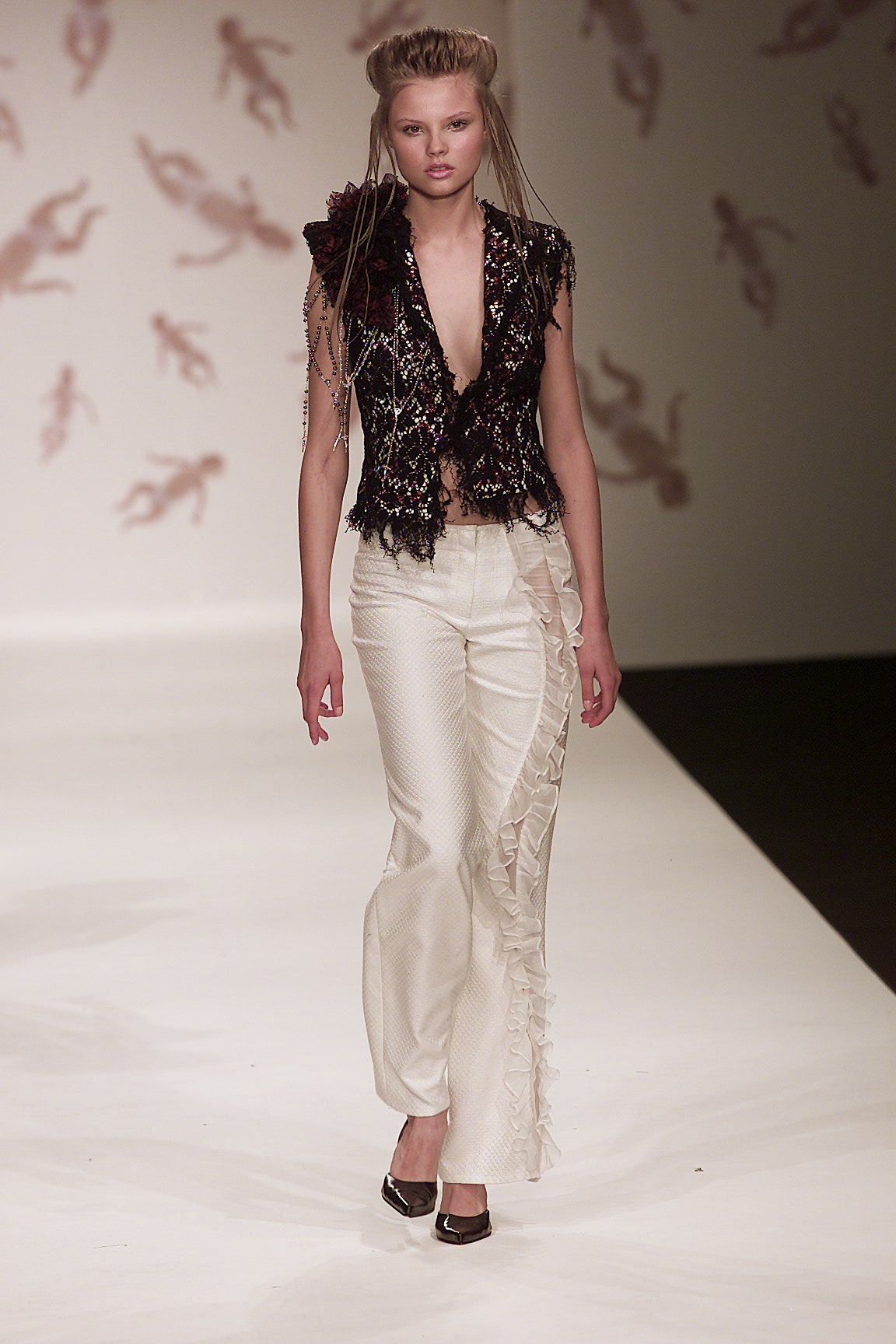 black red embroidered top with flared pants