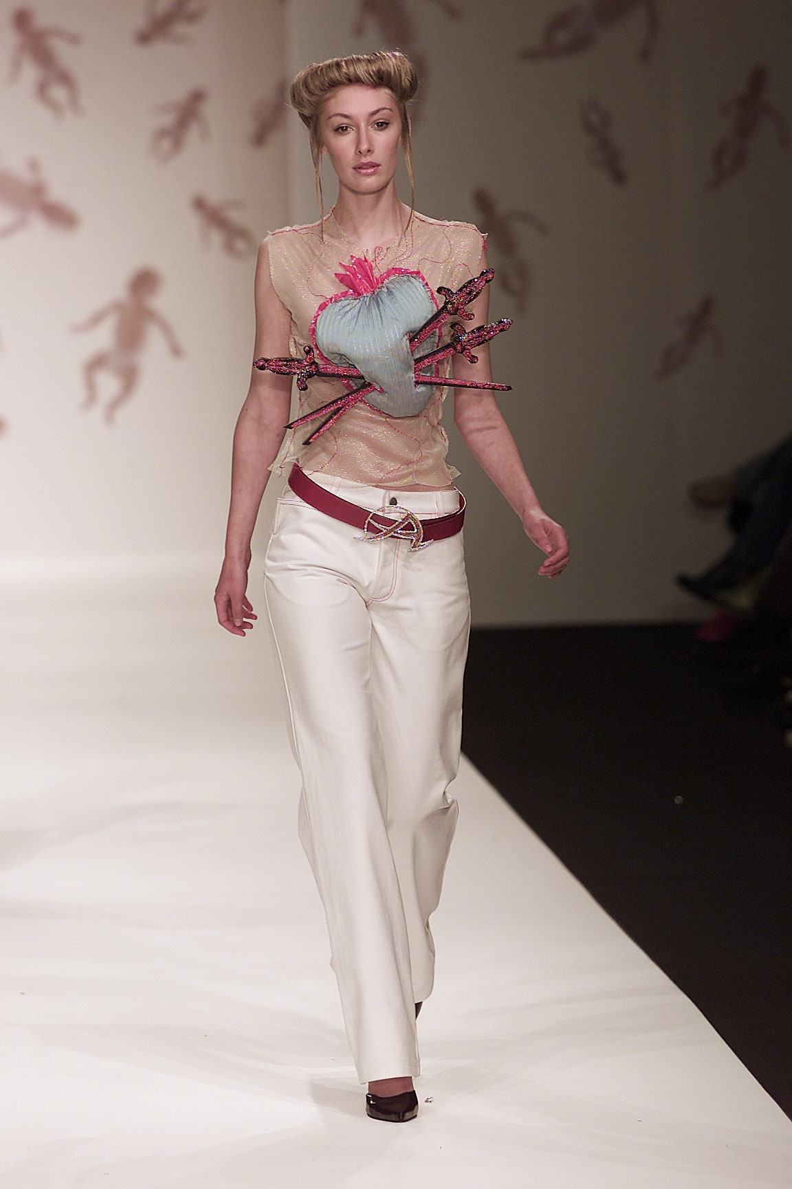 beige silk sleeveless top with embroidery