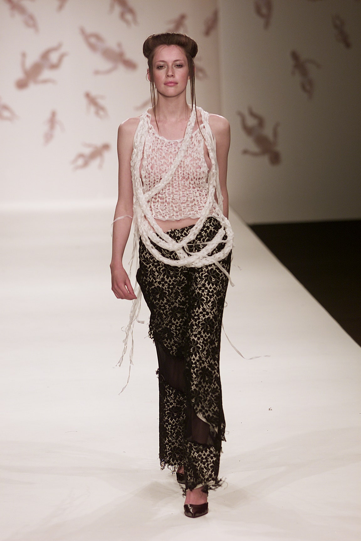 white fitted top and black pants