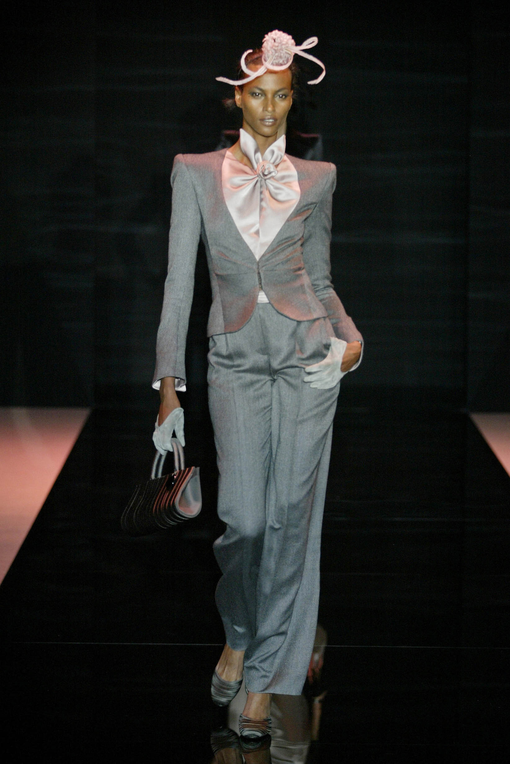 gray tailored suit with ruffled blouse