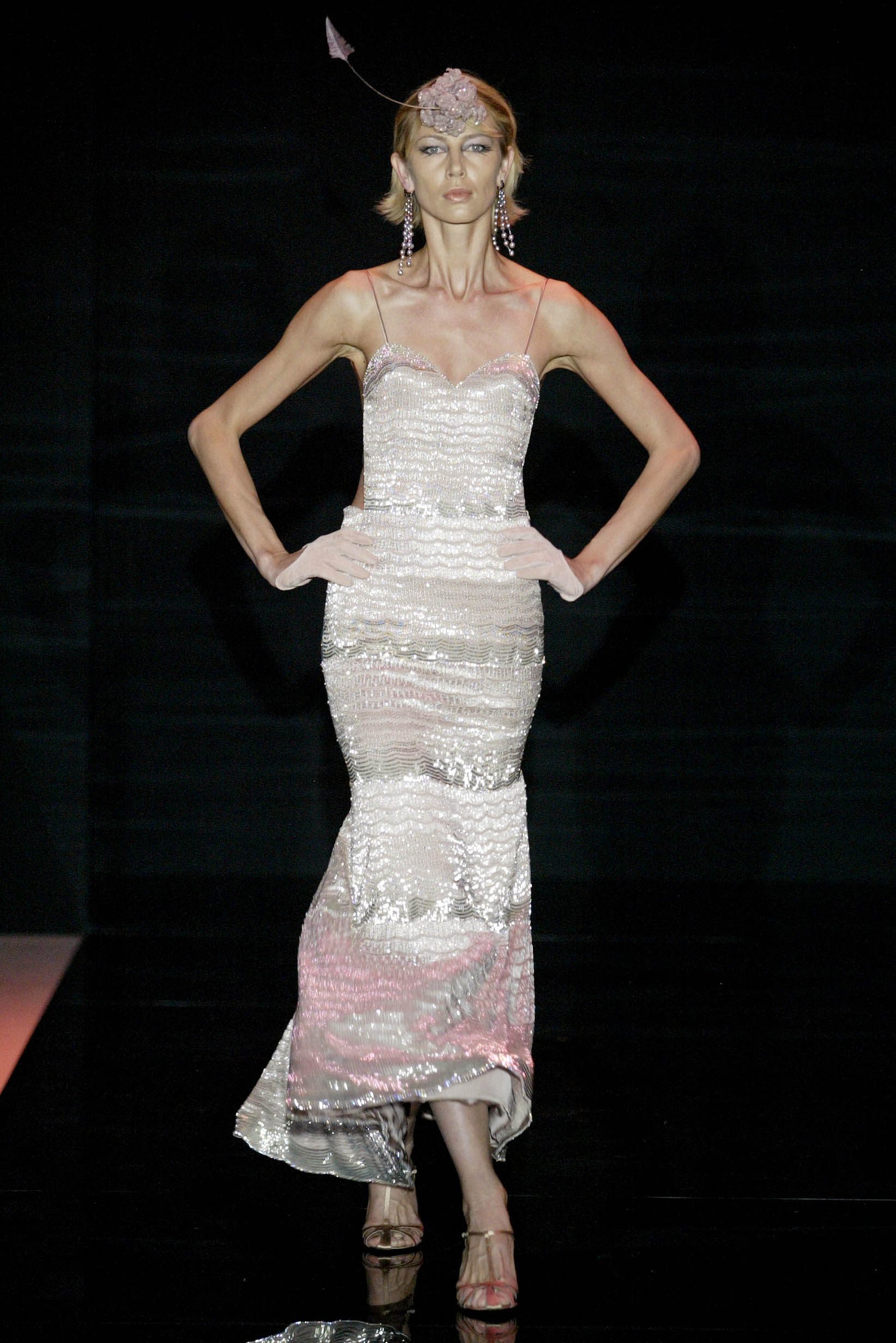 white sequined sleeveless gown
