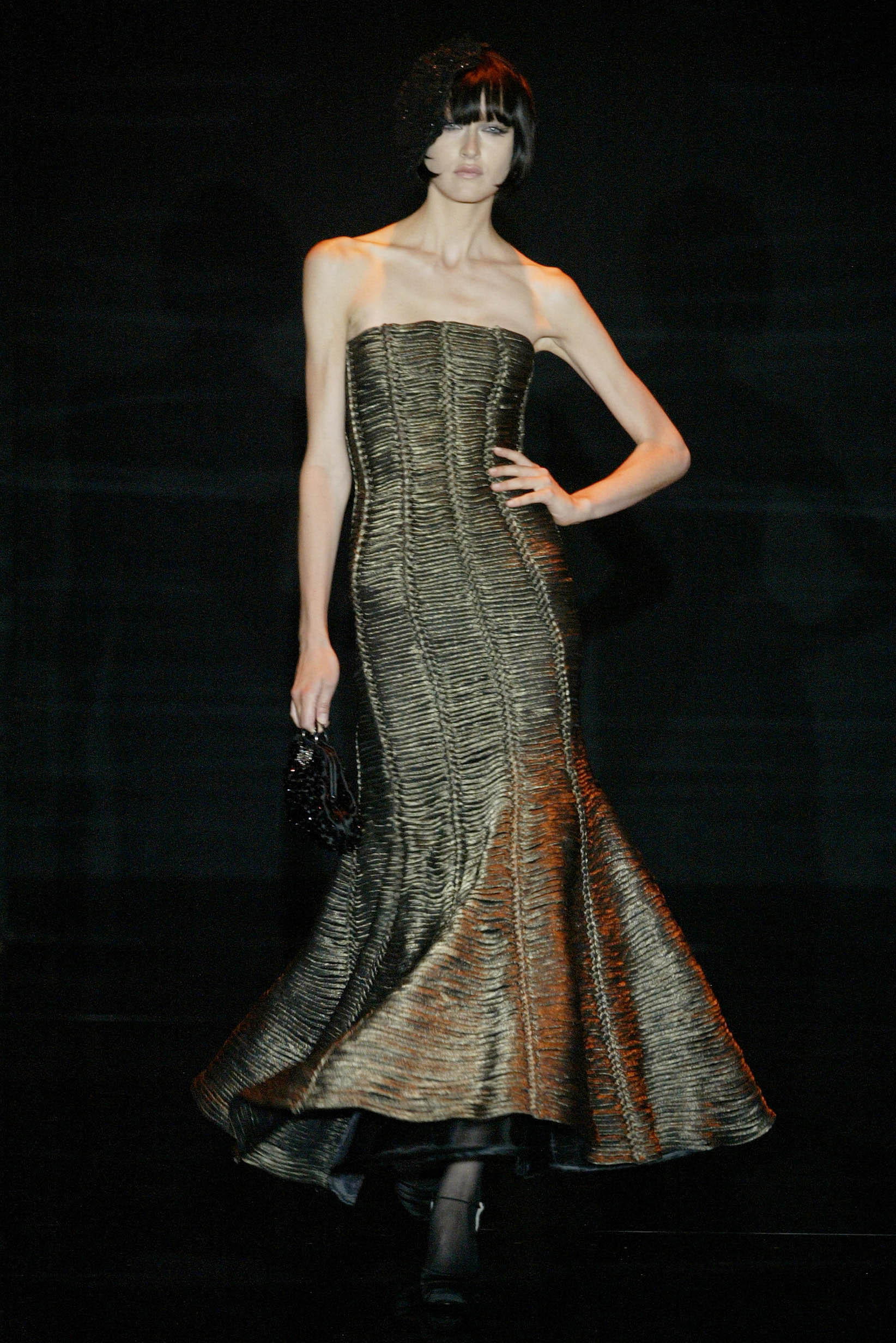 gold and black strapless gown