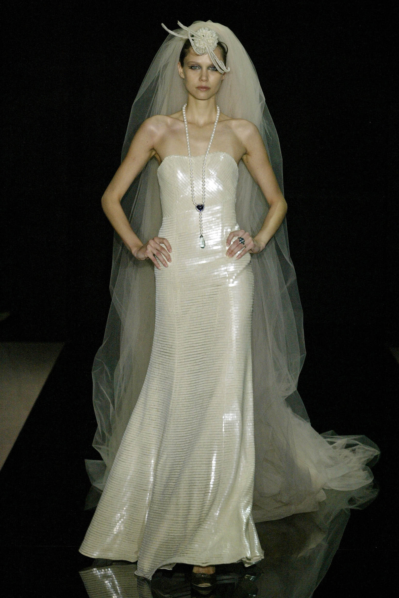 white sequined strapless gown