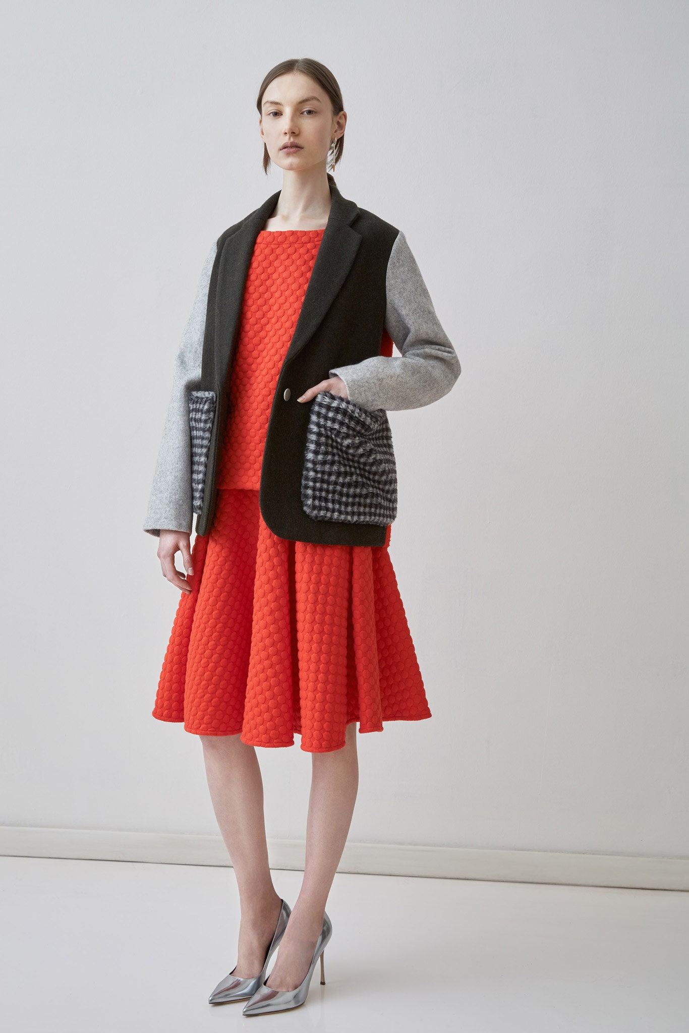 red cotton sleeveless collared fitted pleated top
