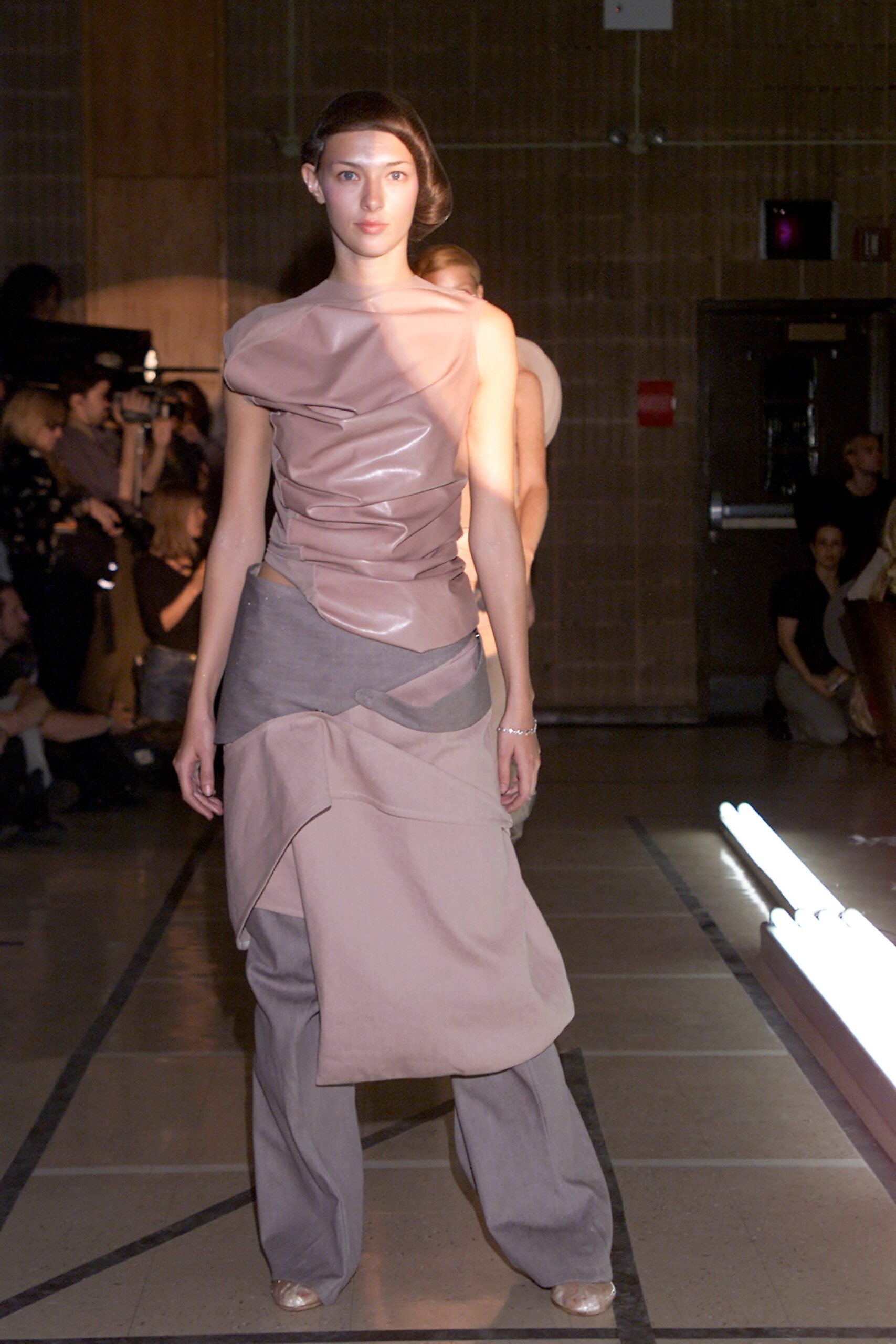 beige silk sleeveless top and gray wide-leg pants