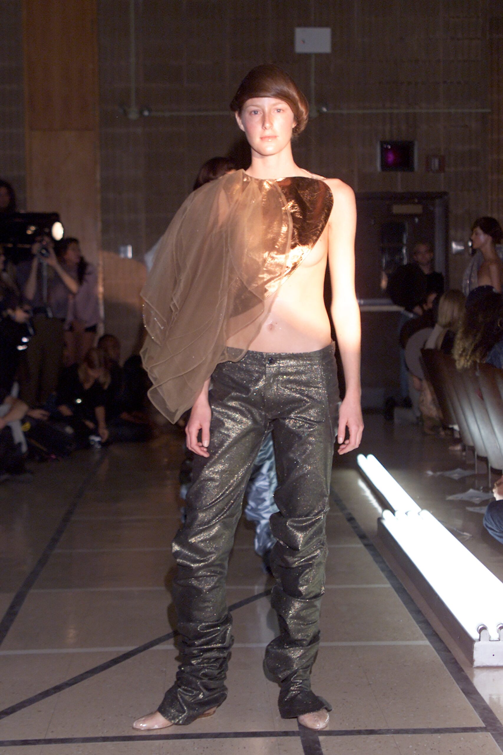 gold chiffon top with black pants