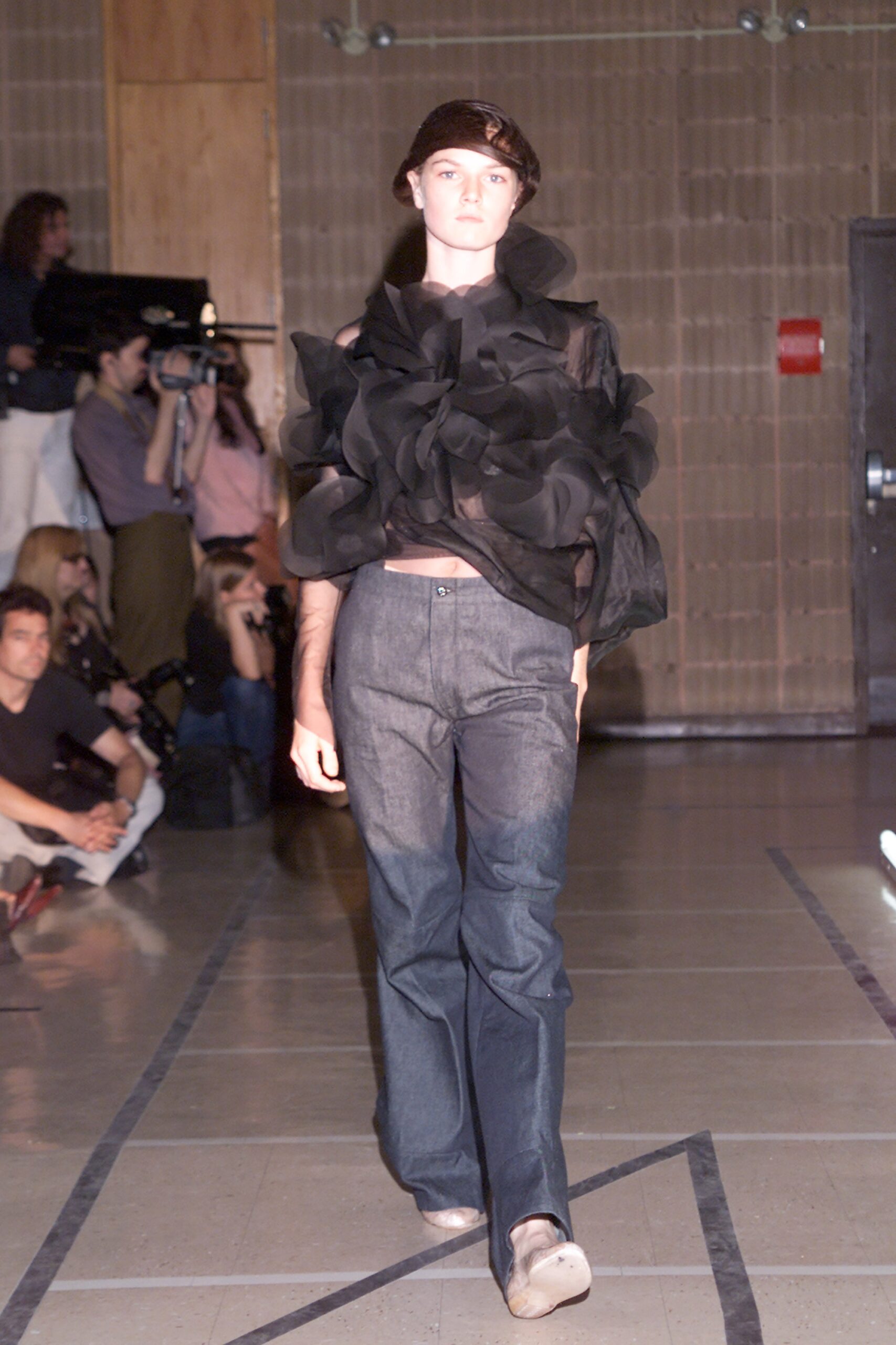 black chiffon top with blue denim pants