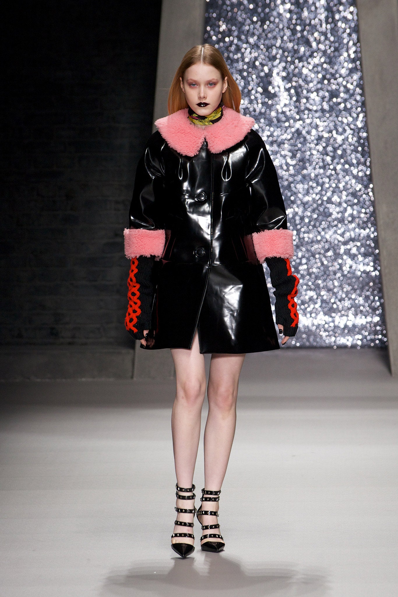 black vinyl coat with pink collar
