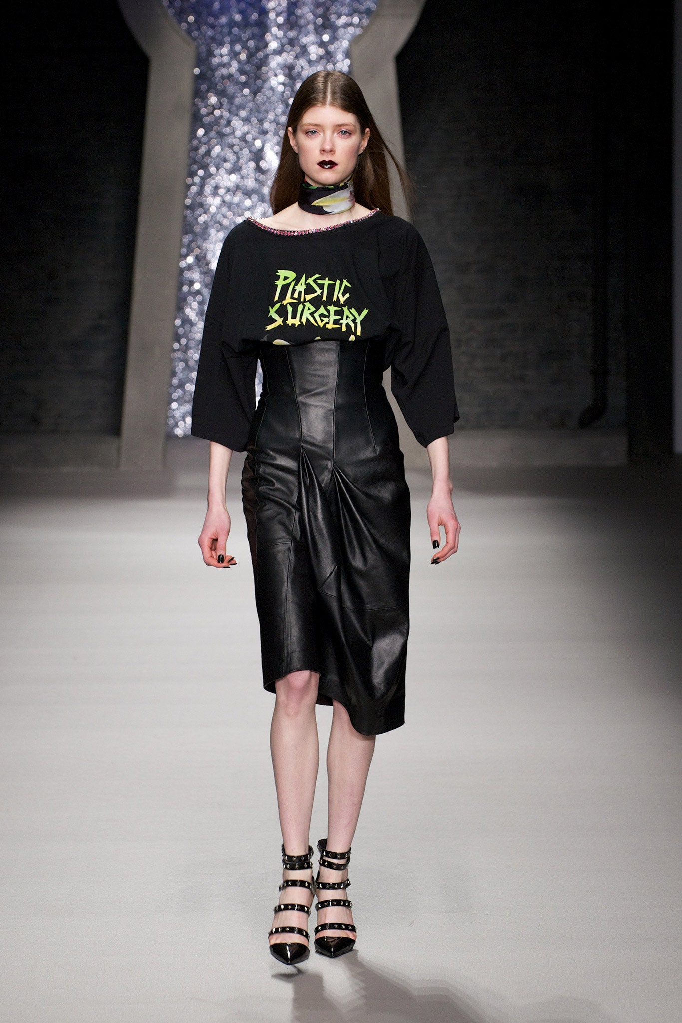 black relaxed top and fitted skirt