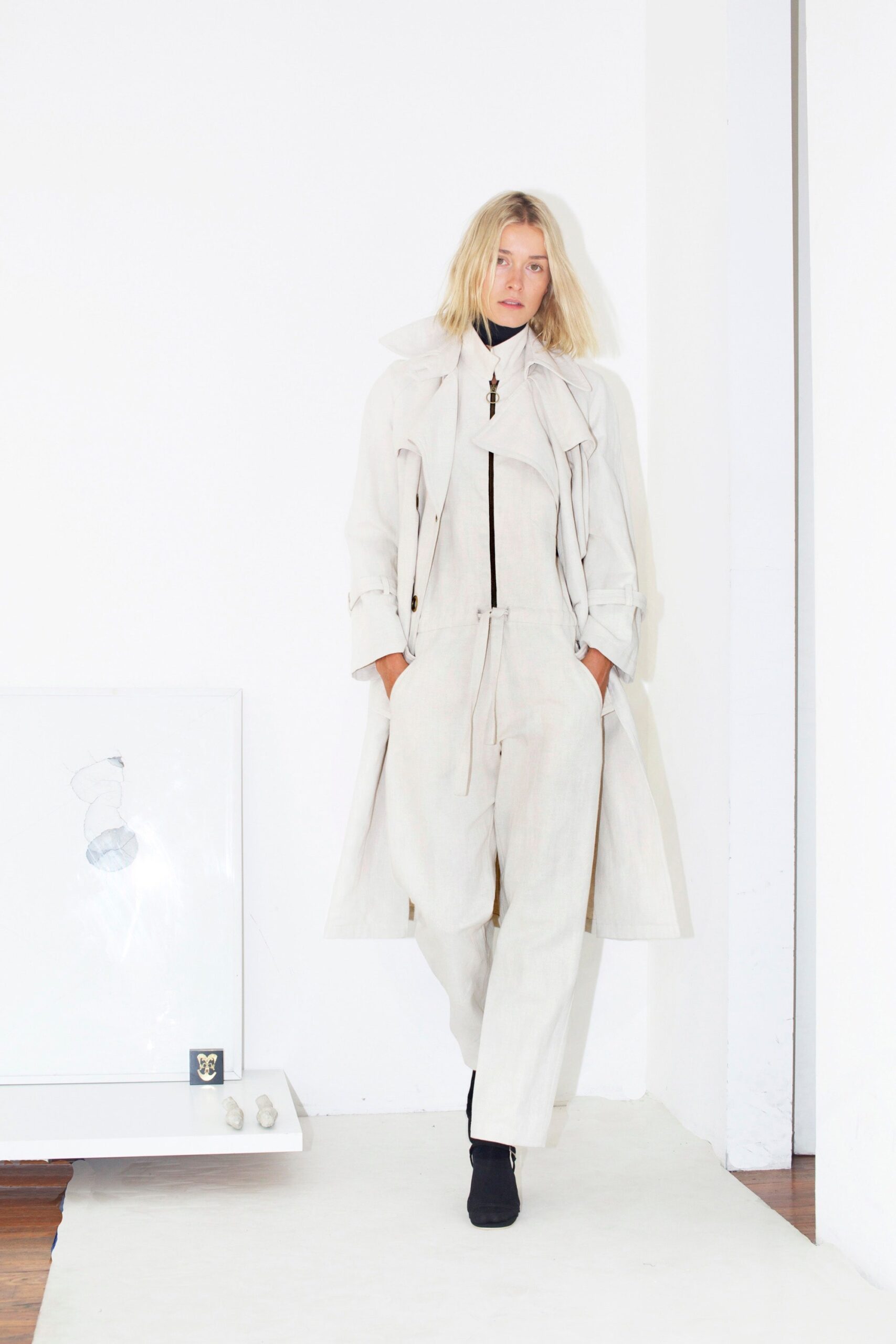 white cotton sleeveless high-neck fitted zippered jumpsuit