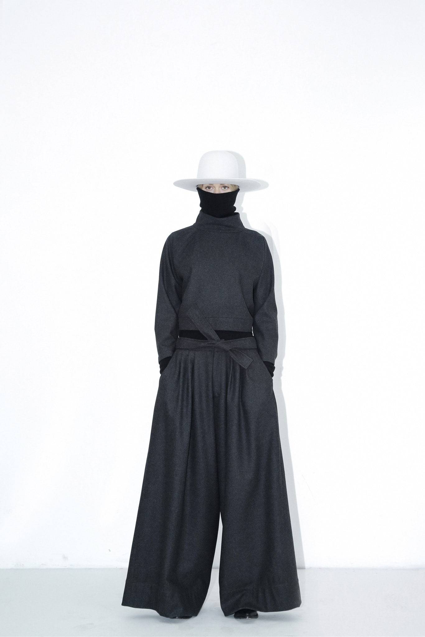 black relaxed top gray wide-leg pants