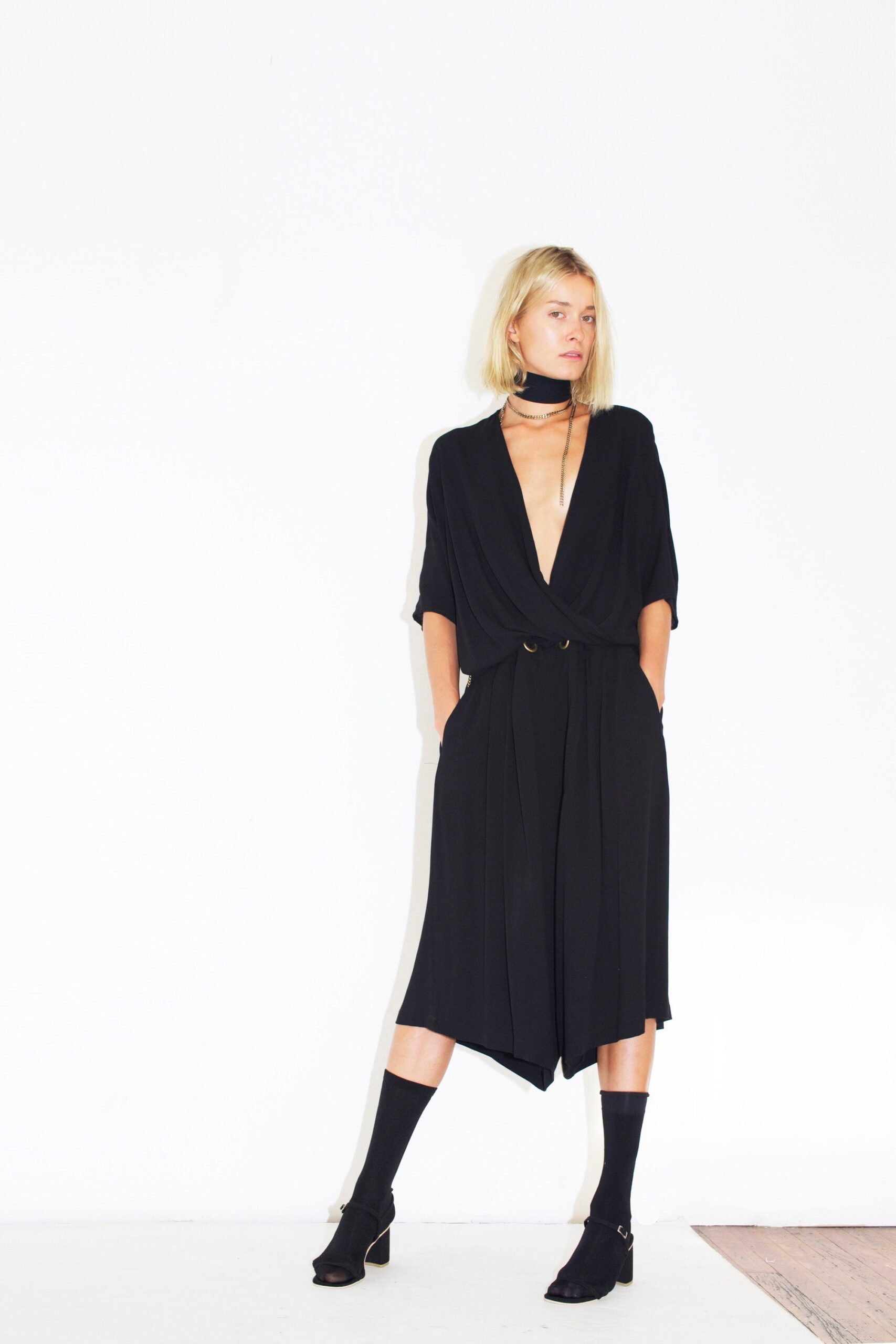 black relaxed v-neck jumpsuit
