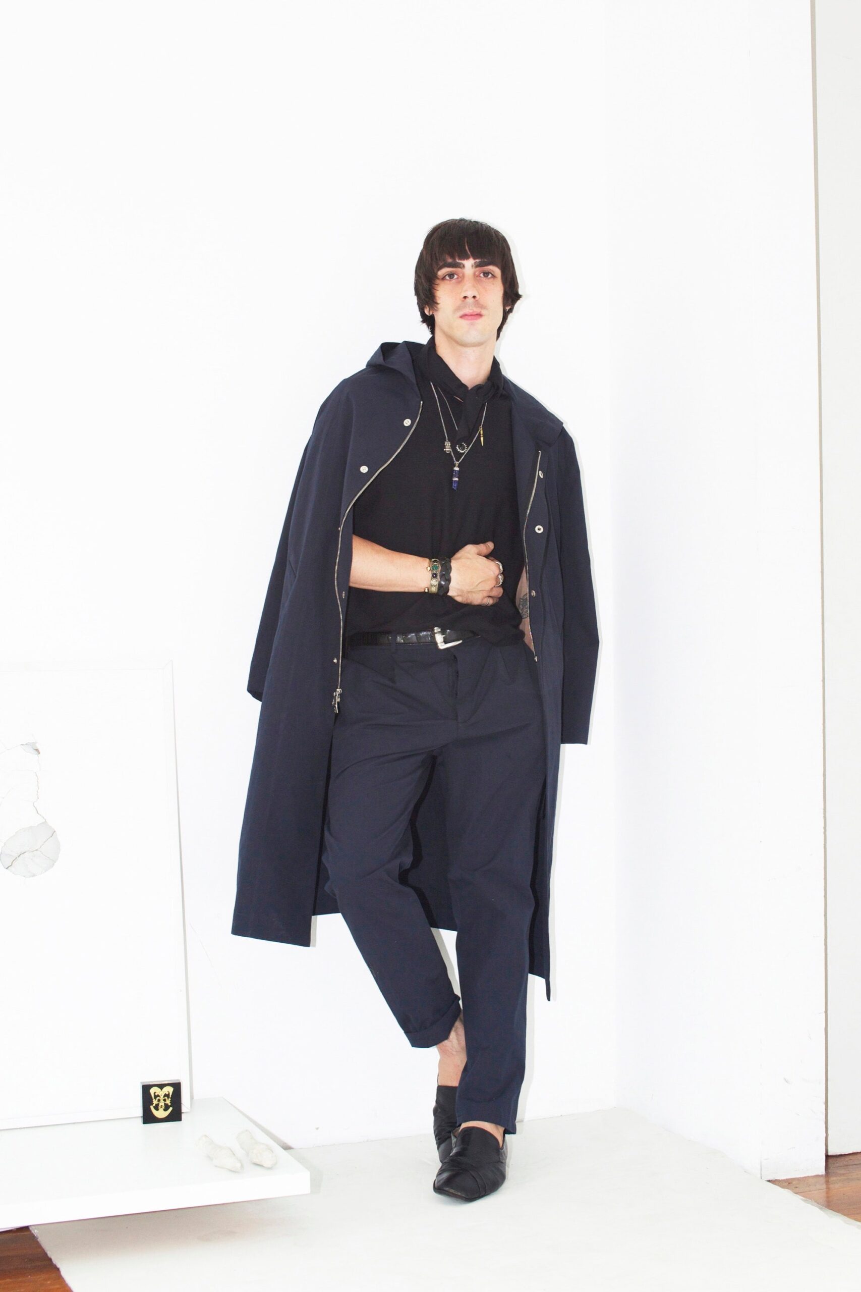 black cotton long-sleeve collared relaxed zippered coat