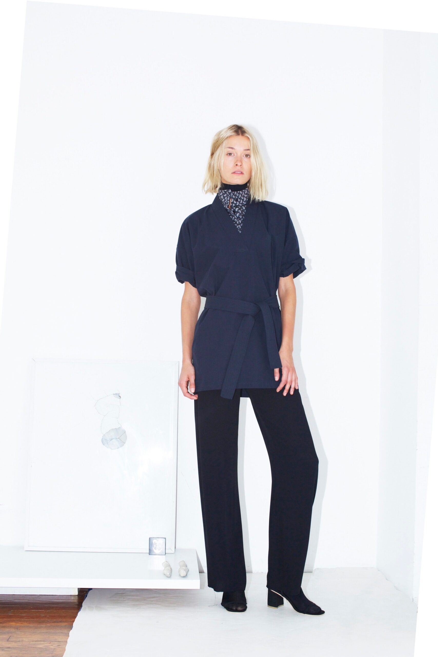 black cotton short-sleeve collared relaxed belted top