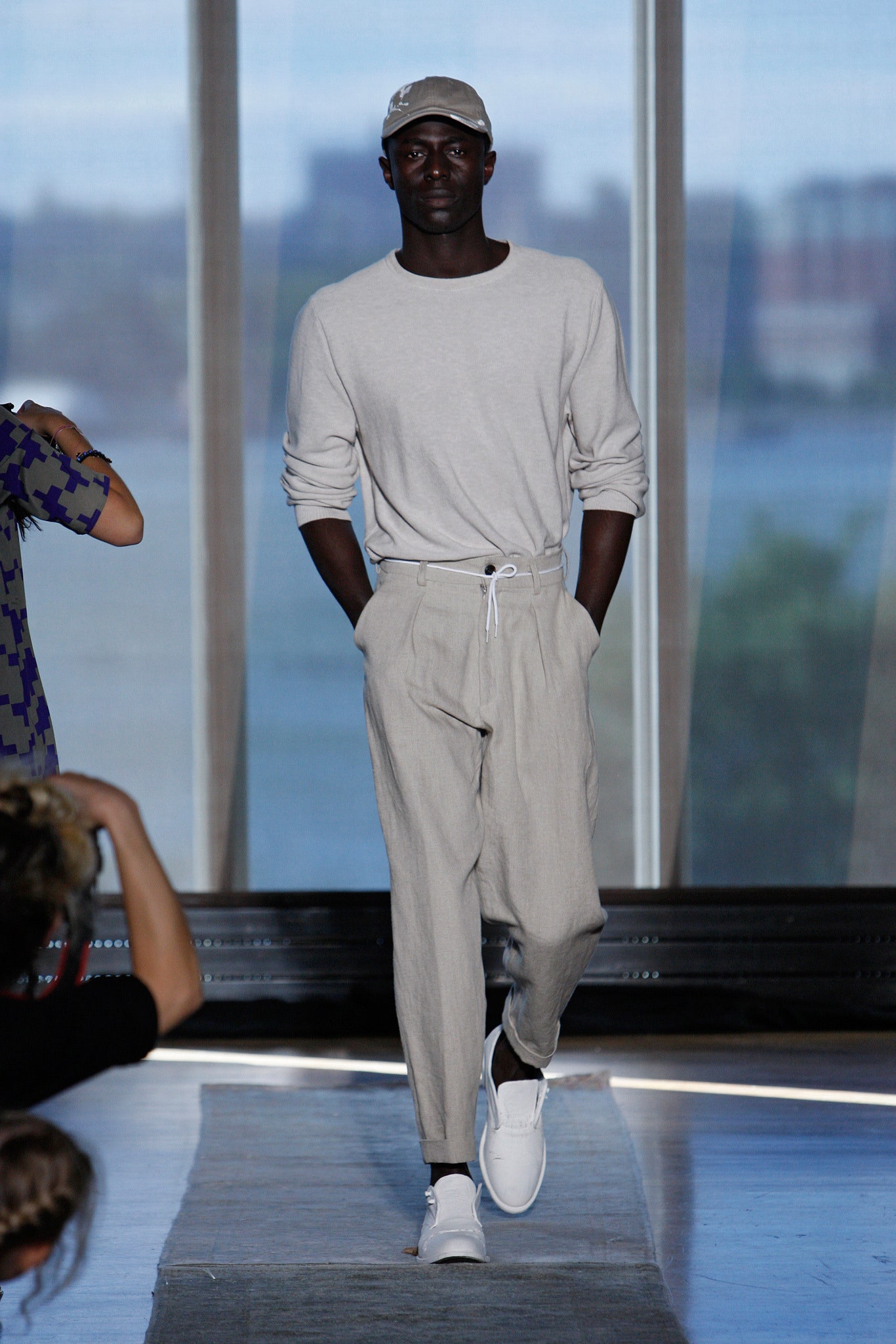 gray relaxed top with beige tailored pants