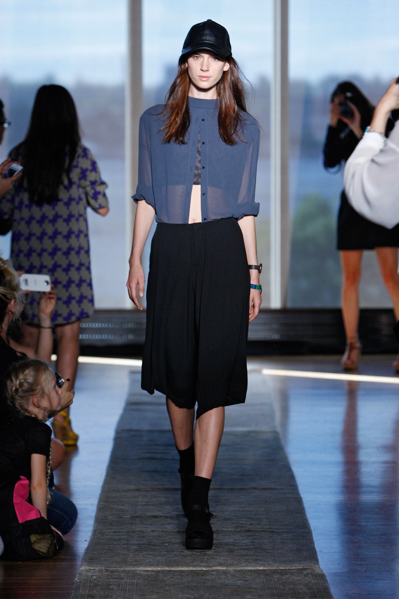 blue relaxed top with black pants