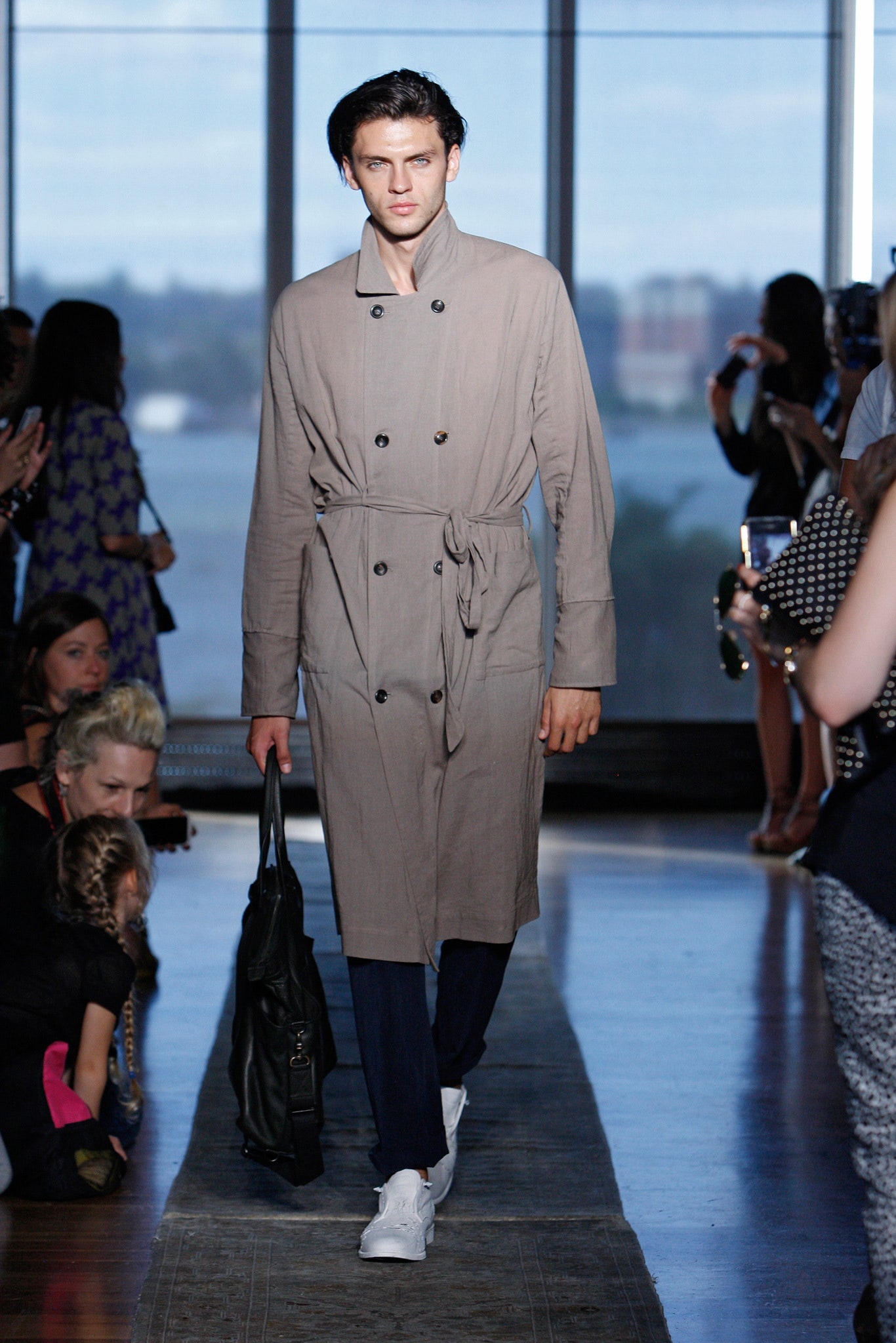 beige trench coat with navy pants