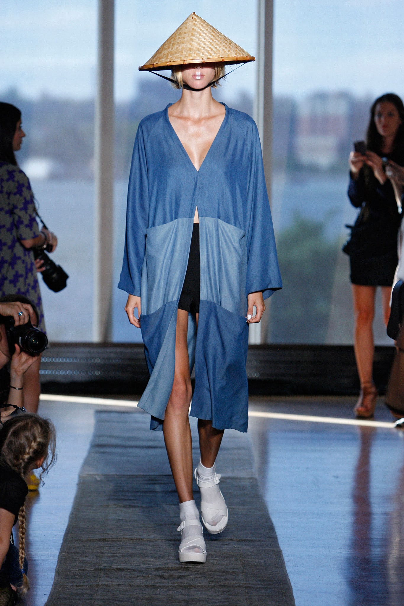 blue relaxed coat with black shorts