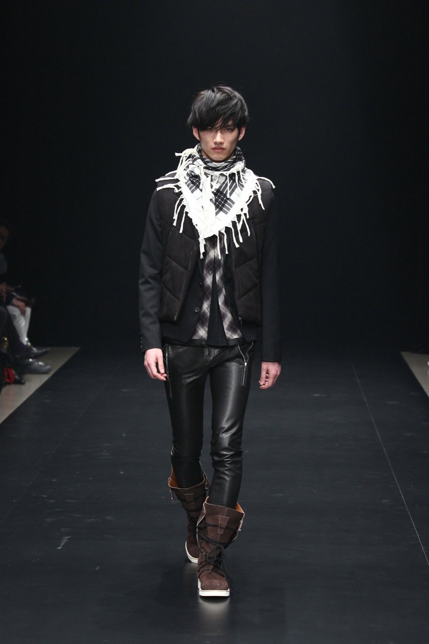 black fitted vest with fringed scarf