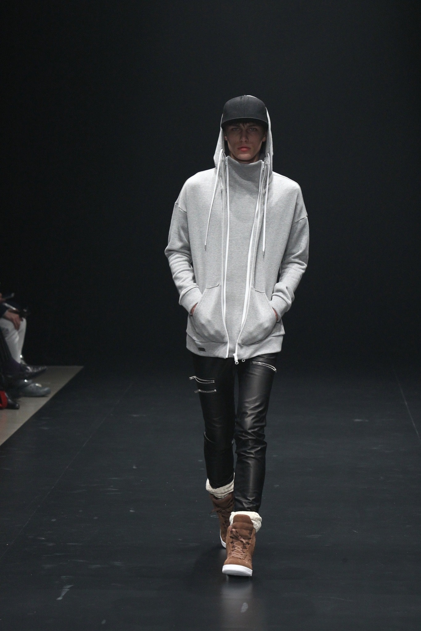 gray oversized hoodie with black leather pants