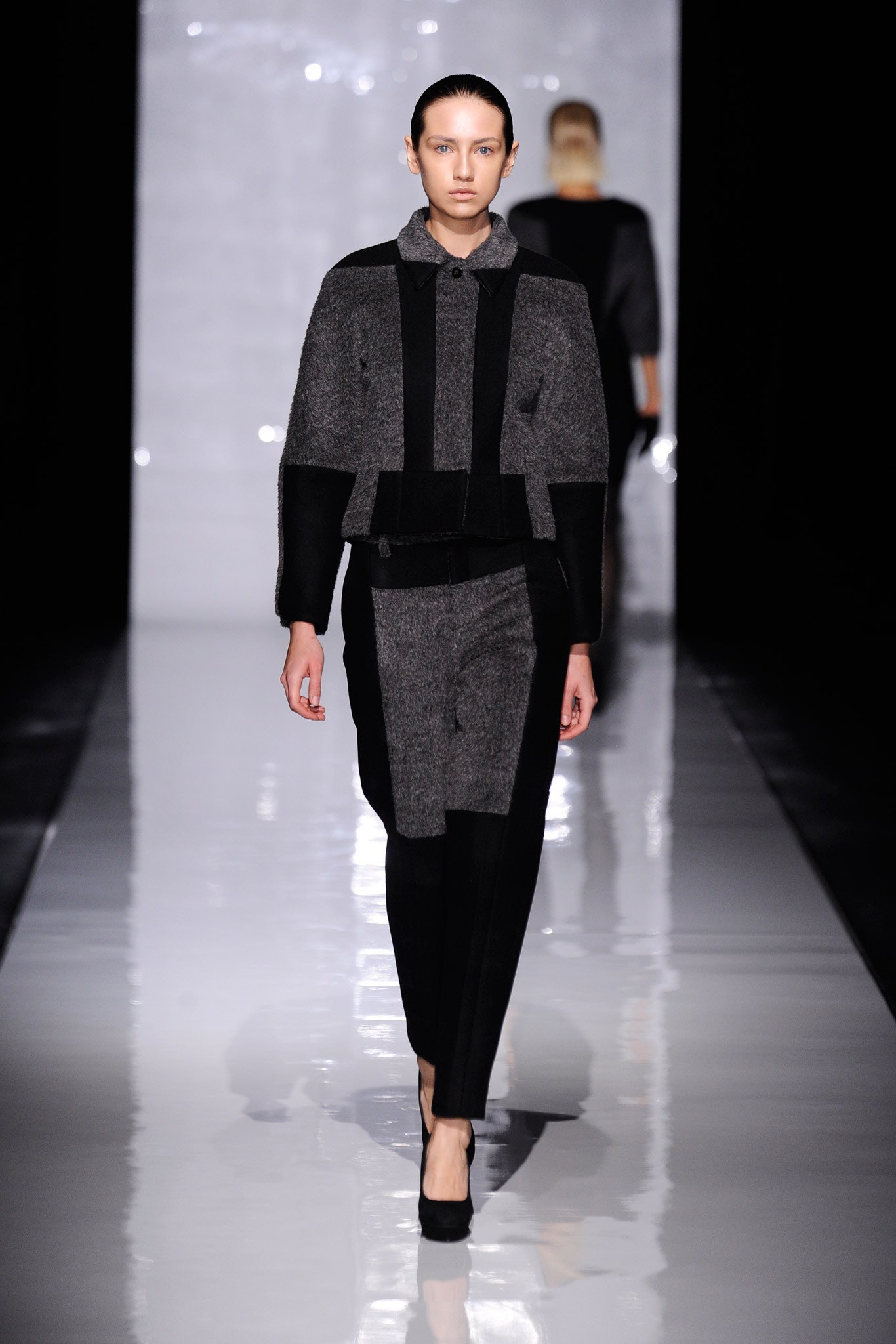 black wool long-sleeve collared fitted buttoned layered jacket
