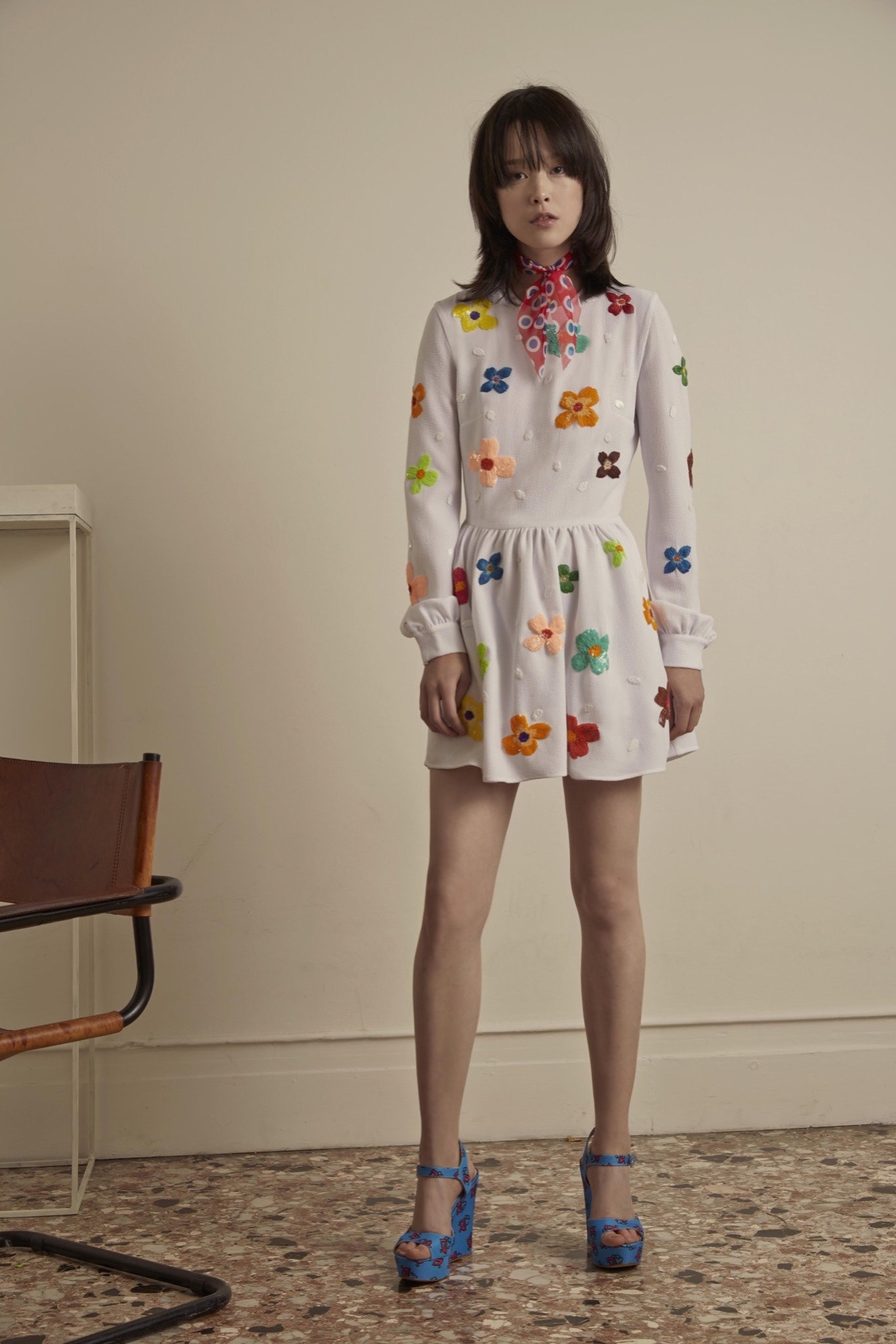 white cotton long-sleeve collared fitted embroidered tiered dress