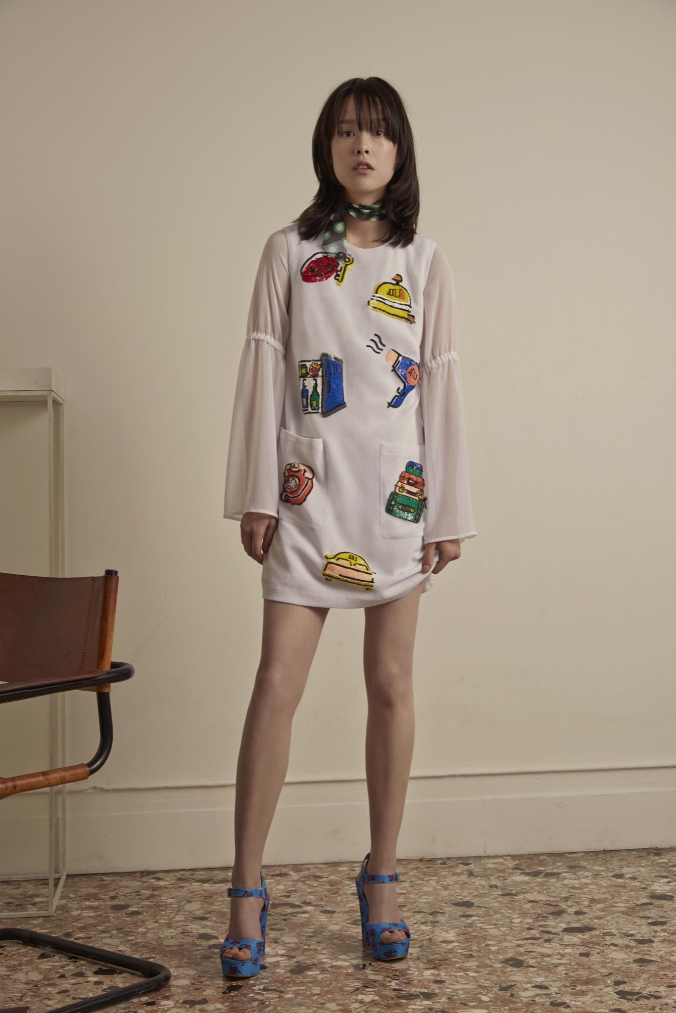 white fitted embroidered dress