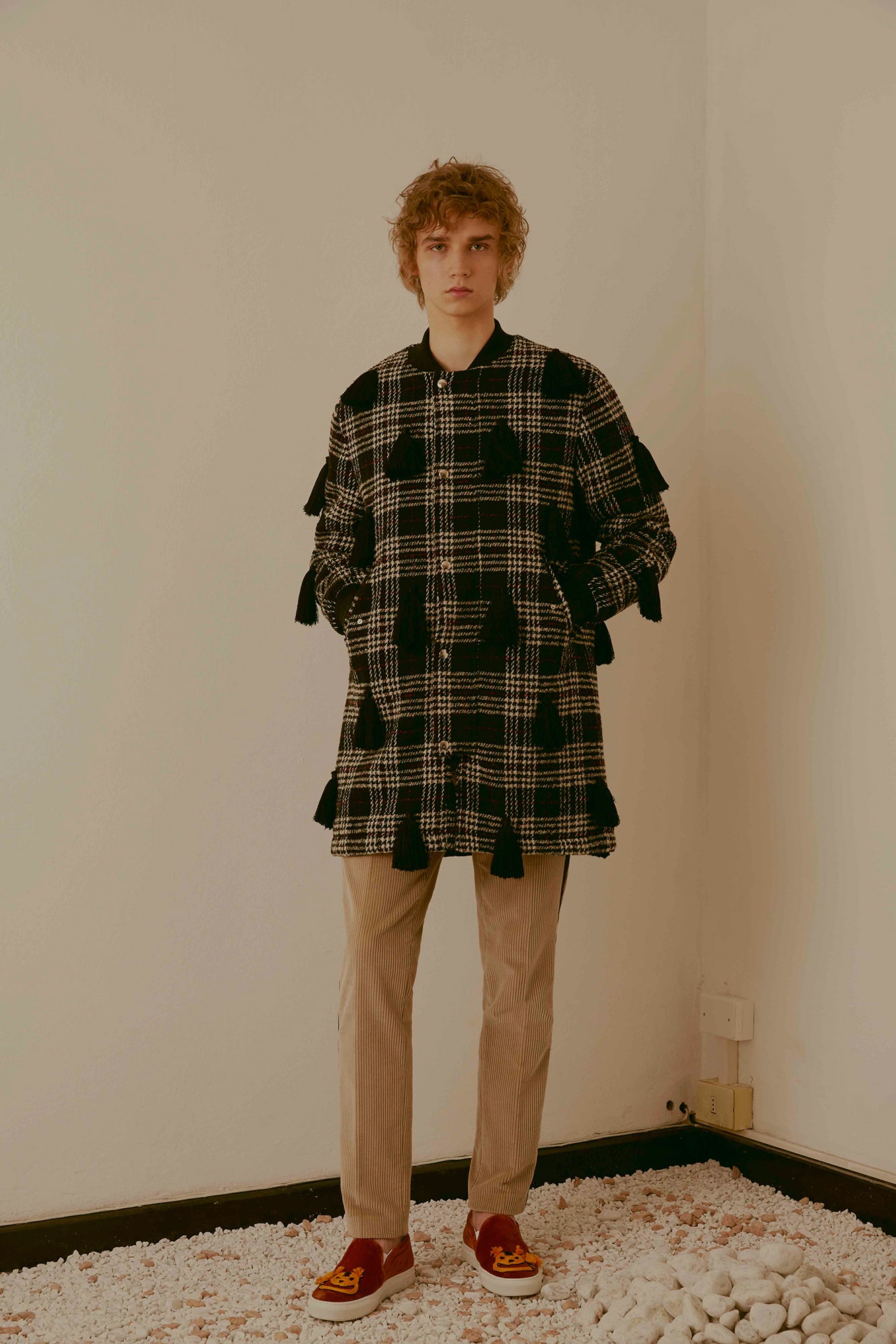 black cotton long-sleeve collared relaxed checked fringed coat
