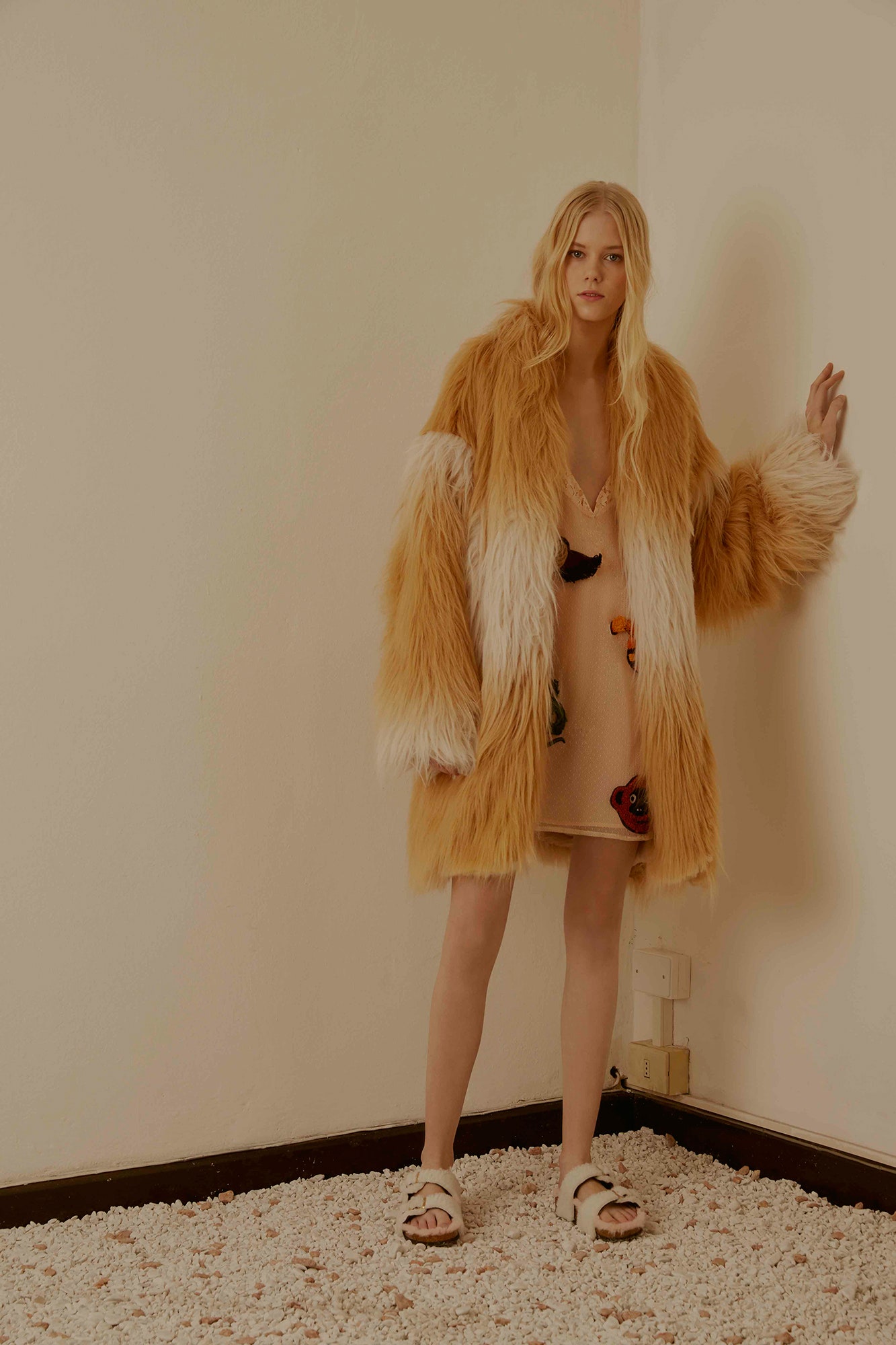 oversized faux-fur coat and mini dress