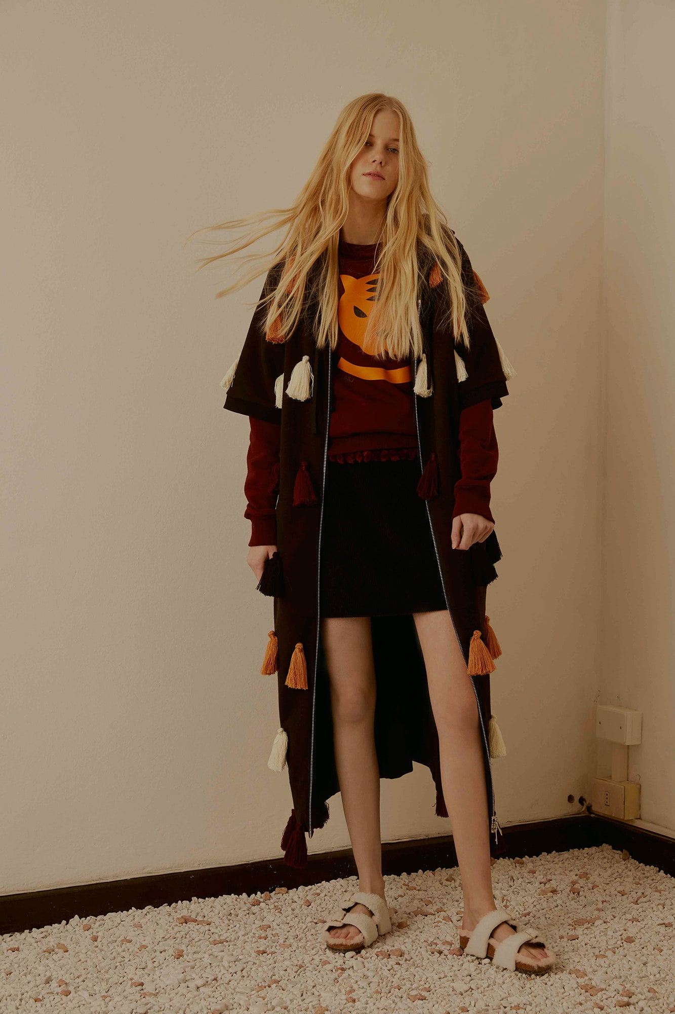 black cotton long-sleeve collared relaxed layered fringed coat
