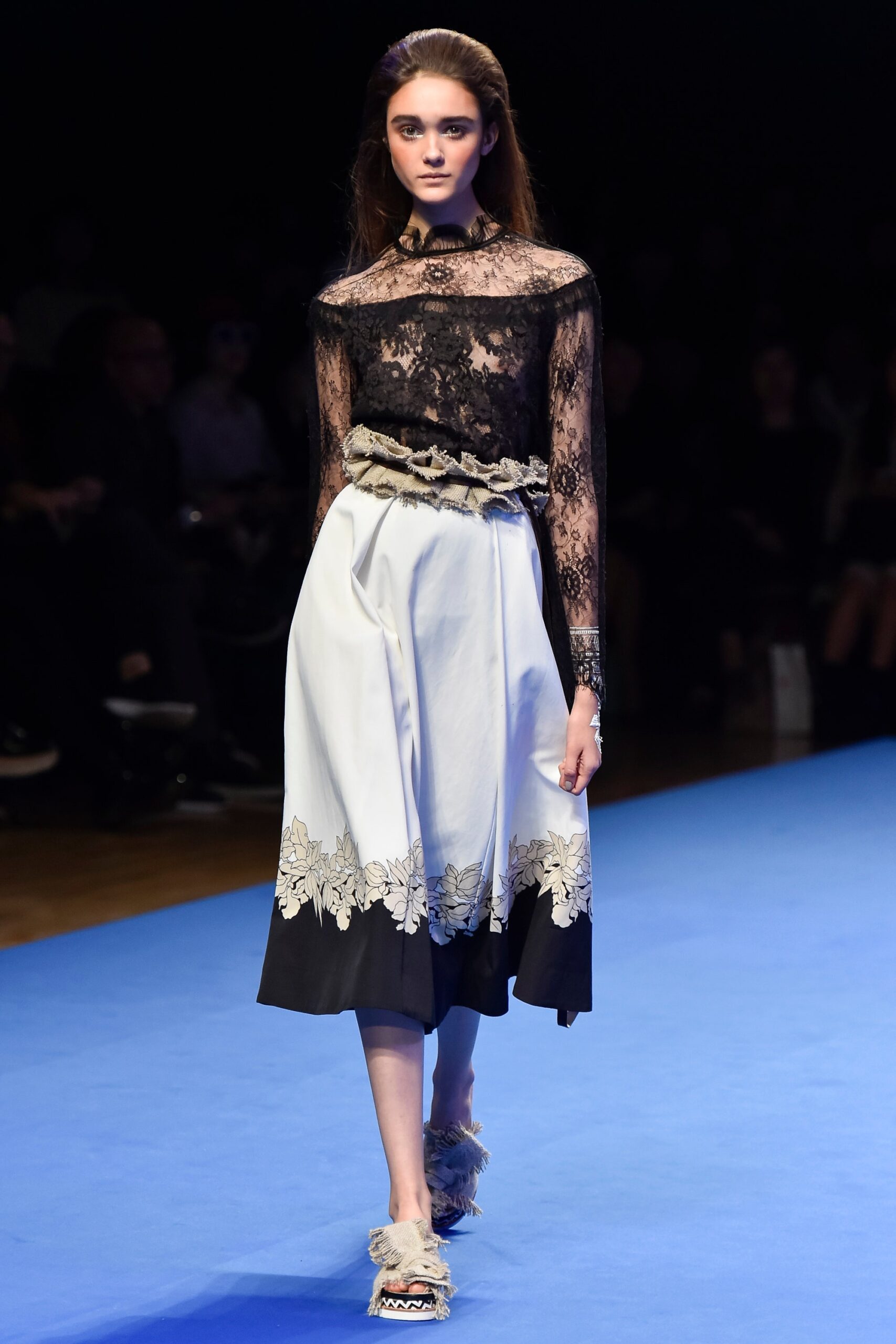 black lace top and white embroidered skirt
