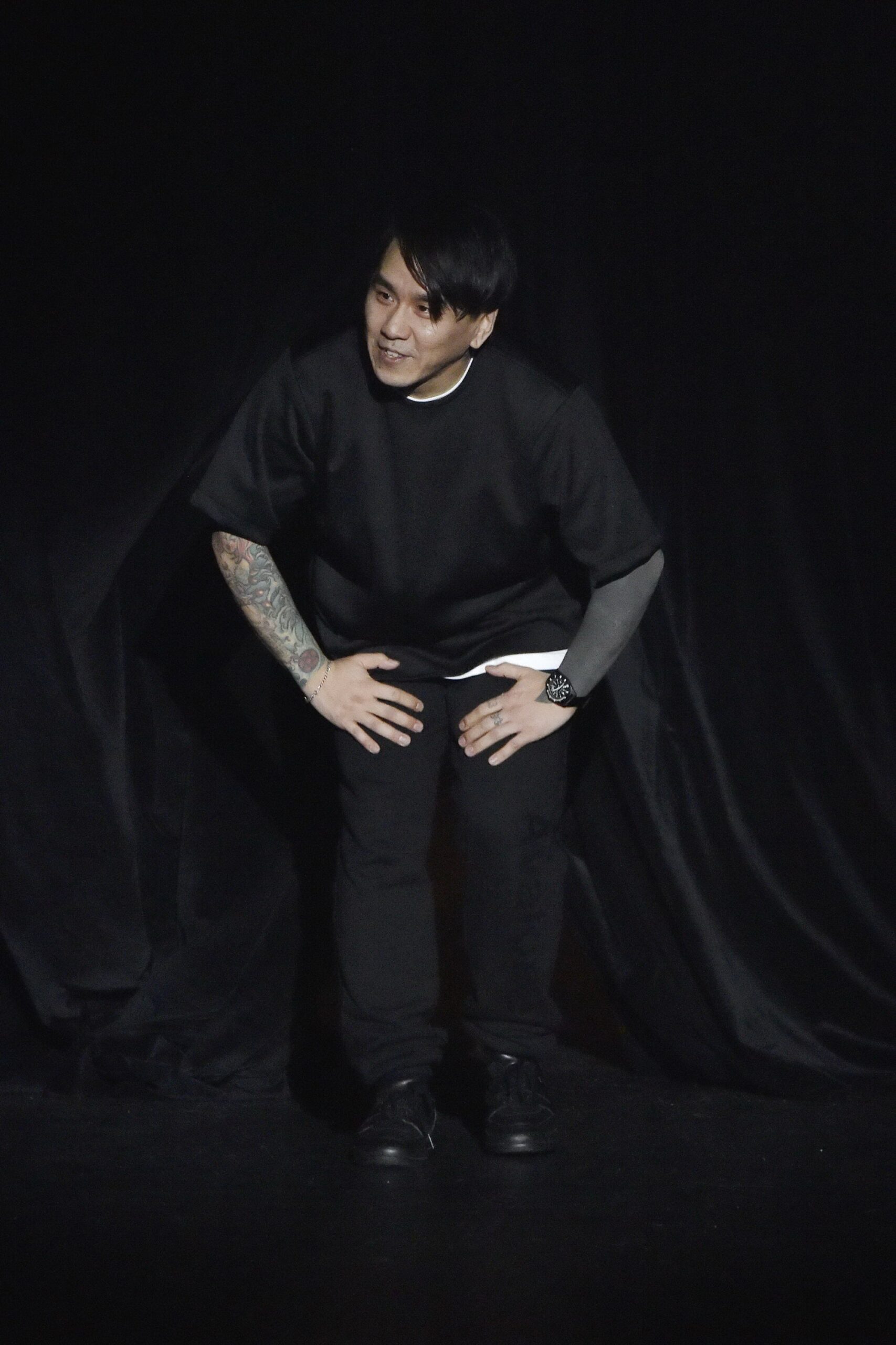 black relaxed top and fitted pants