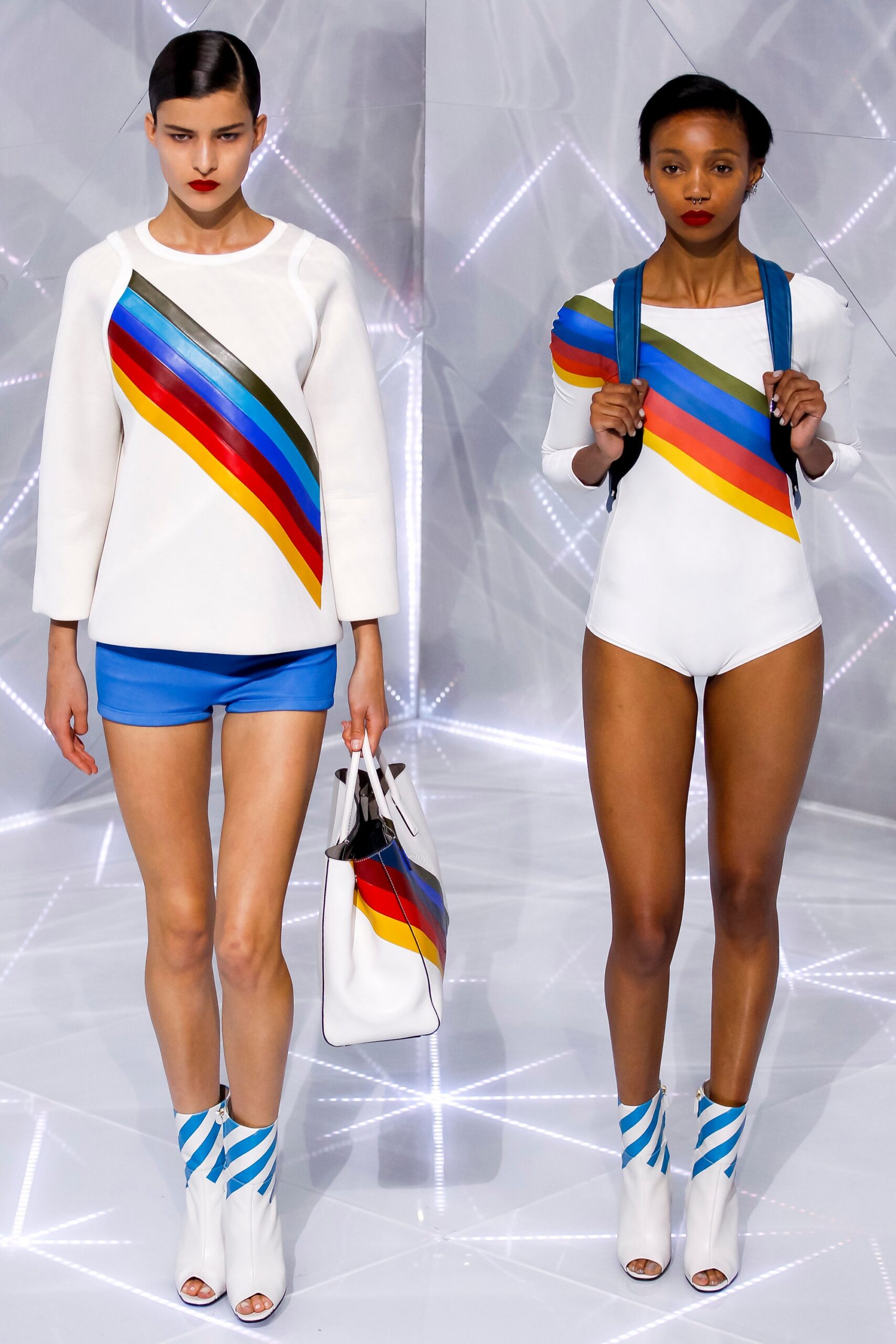 color-blocked white top and blue shorts