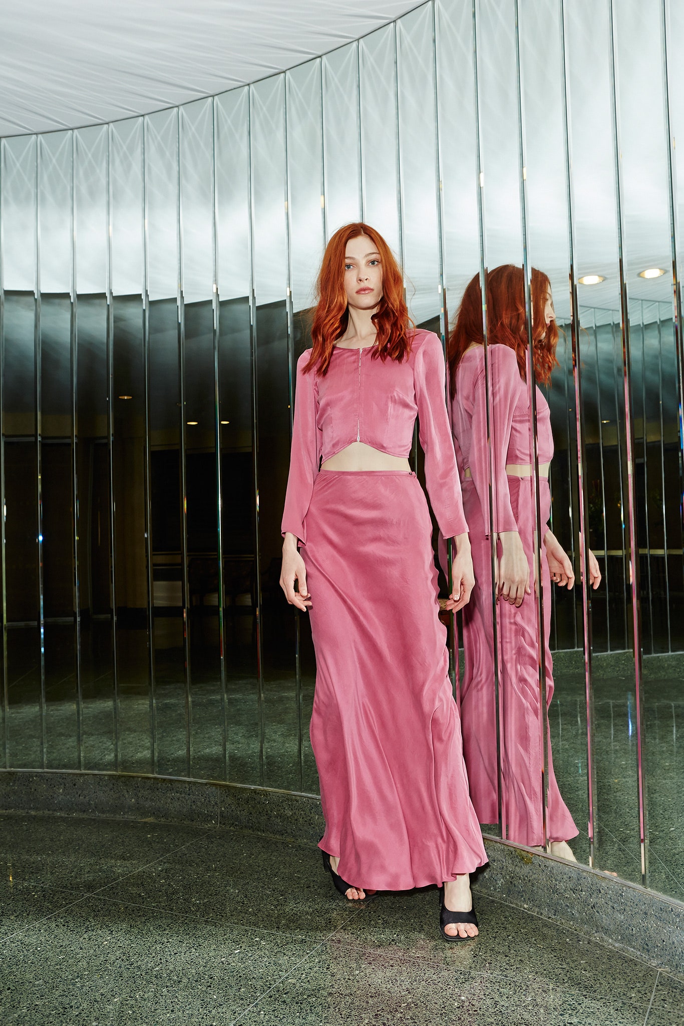 pink silk fitted top and skirt