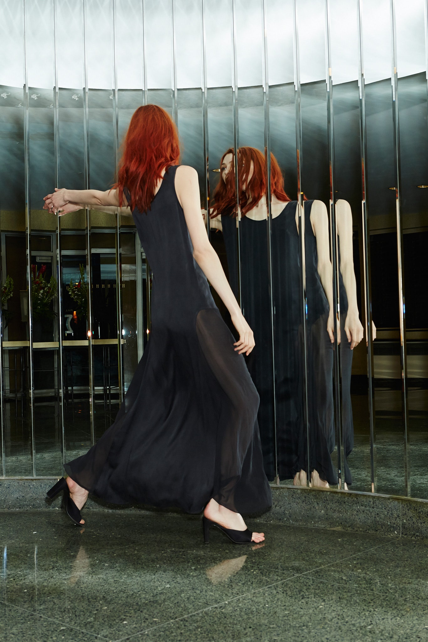 black silk sleeveless dress