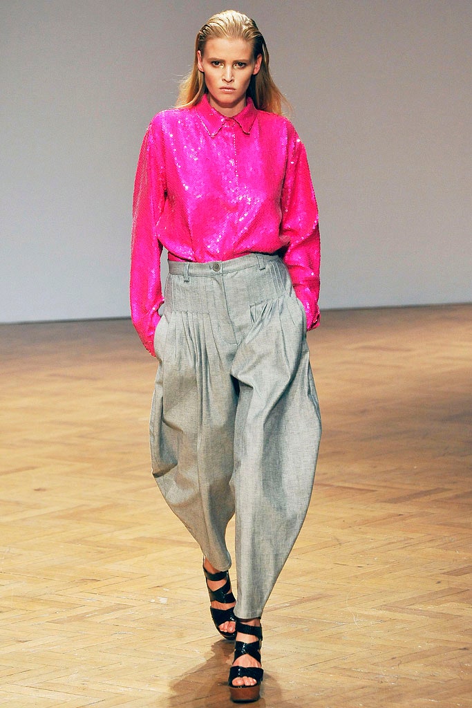 pink sequined shirt with gray pants