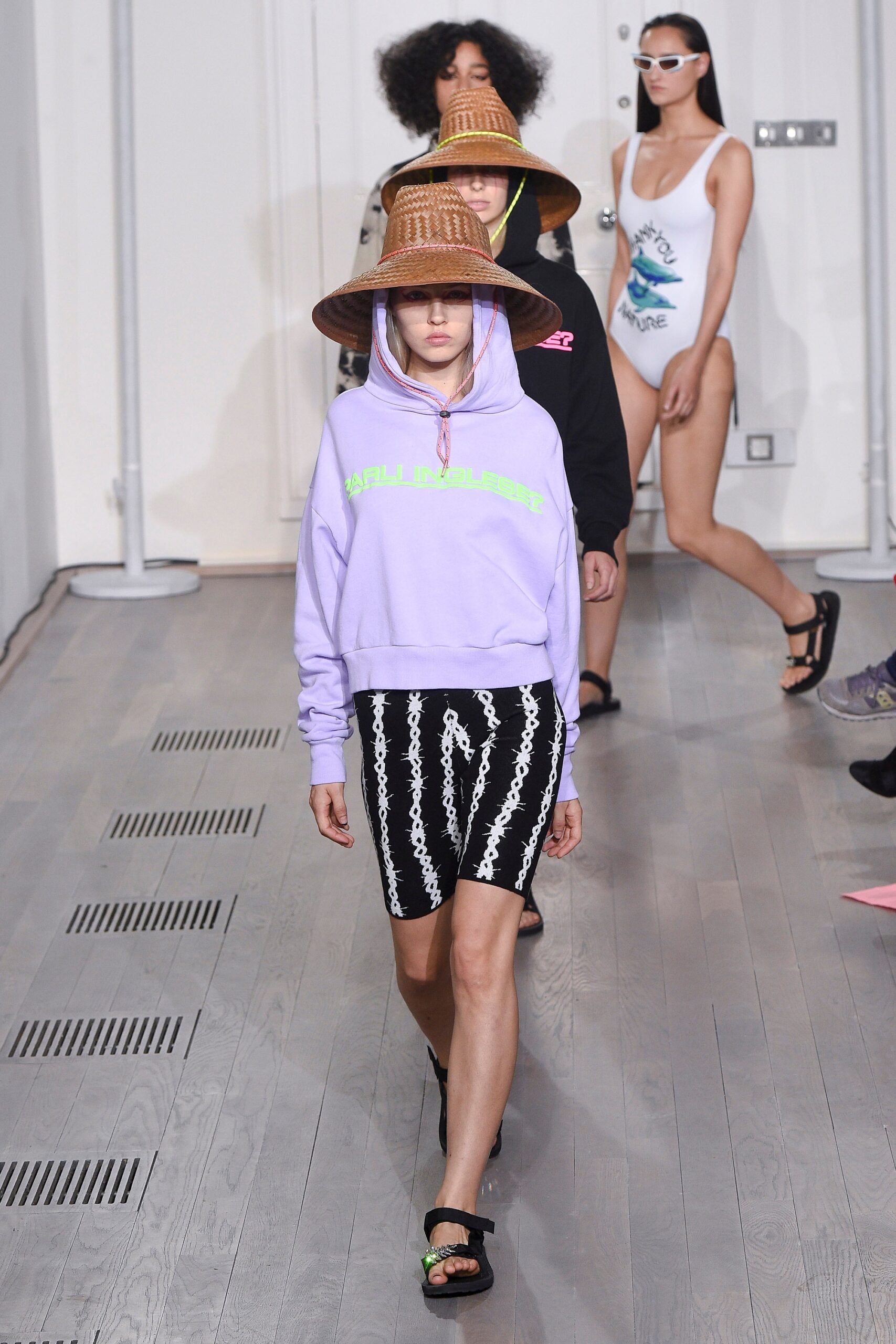 purple hoodie and black shorts