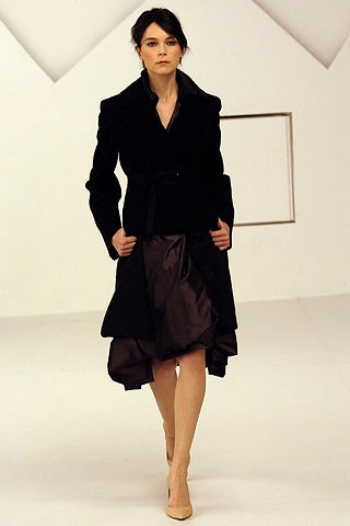 black wool coat and silk dress