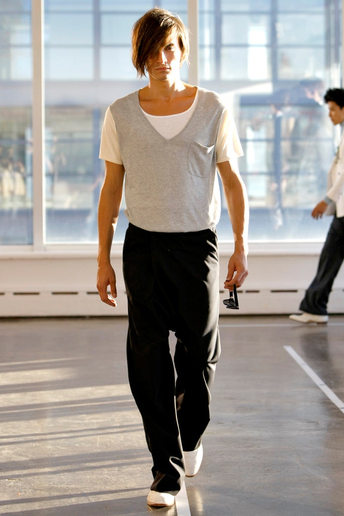 gray top white t-shirt black pants