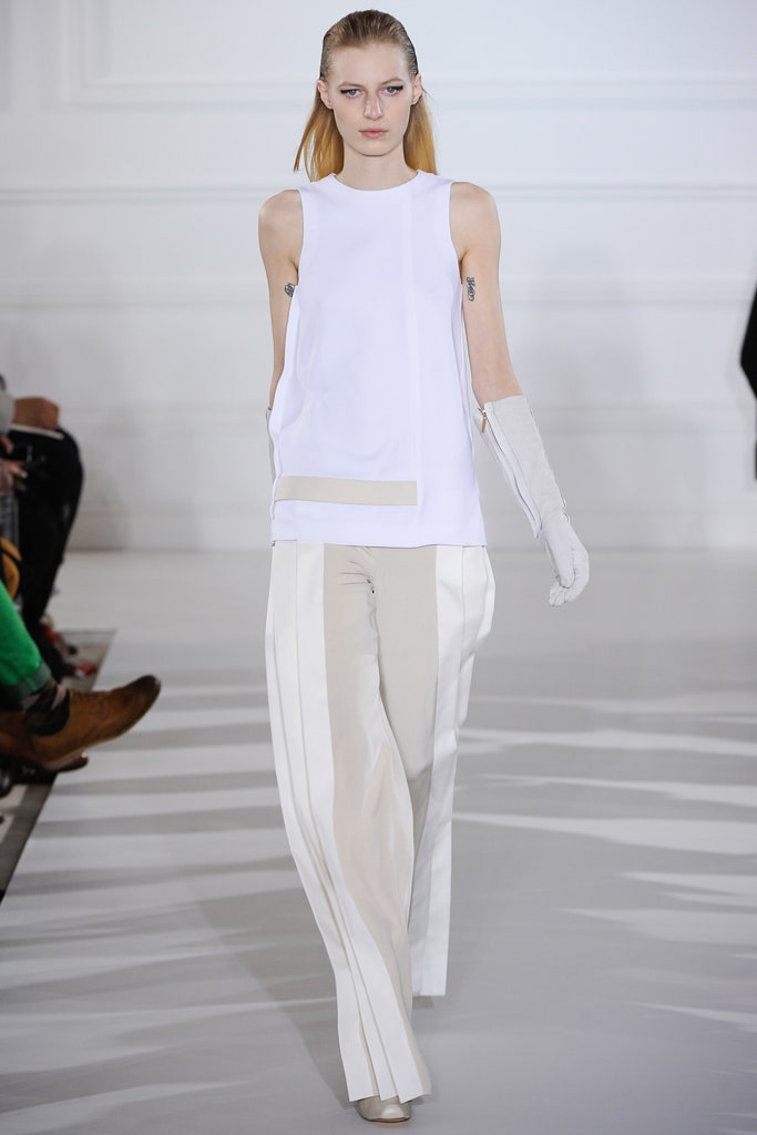 white fitted top with beige tailored pants