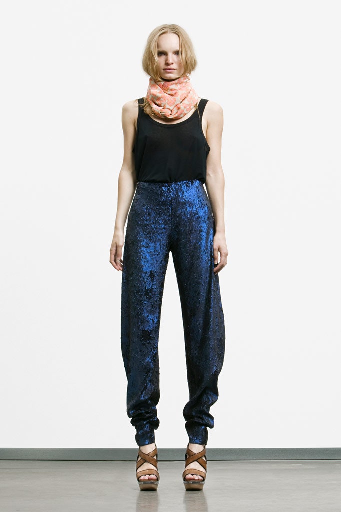 black fitted top with blue pants