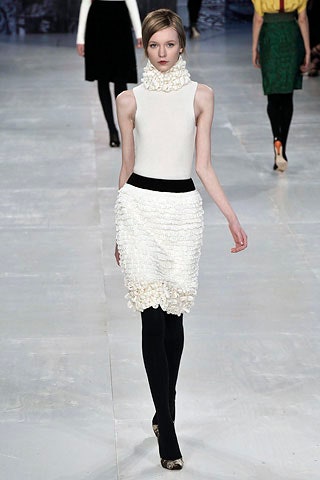 white fitted dress with ruffles