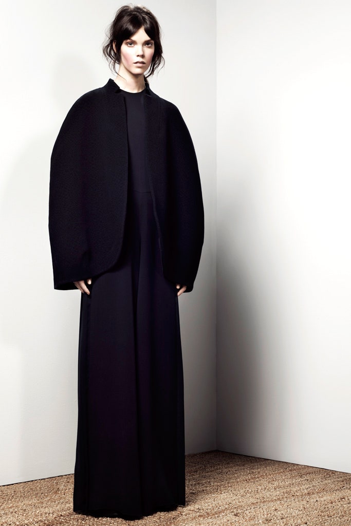 black silk gown with oversized cape