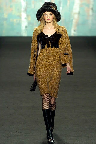 brown fitted mini dress with gold jacket