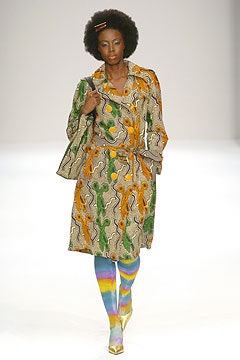 colorful printed coat with gold shoes