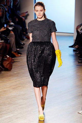 black silk top with pleated skirt