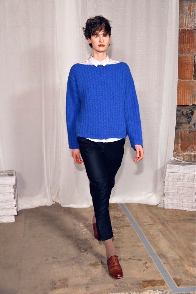 blue relaxed sweater with black pants