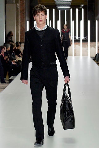 black tailored suit with bag