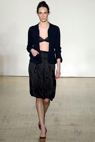 black blazer with pleated skirt